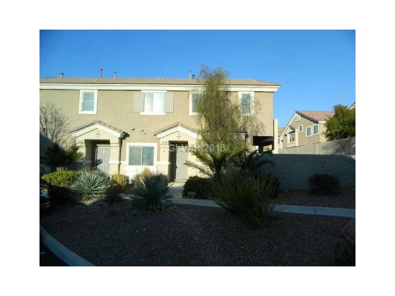1553 Rusty Ridge Lane Henderson, NV 89002 - Photo 2 of 35 Property Photo. SIDE OF UNIT WITH FRONT DOOR