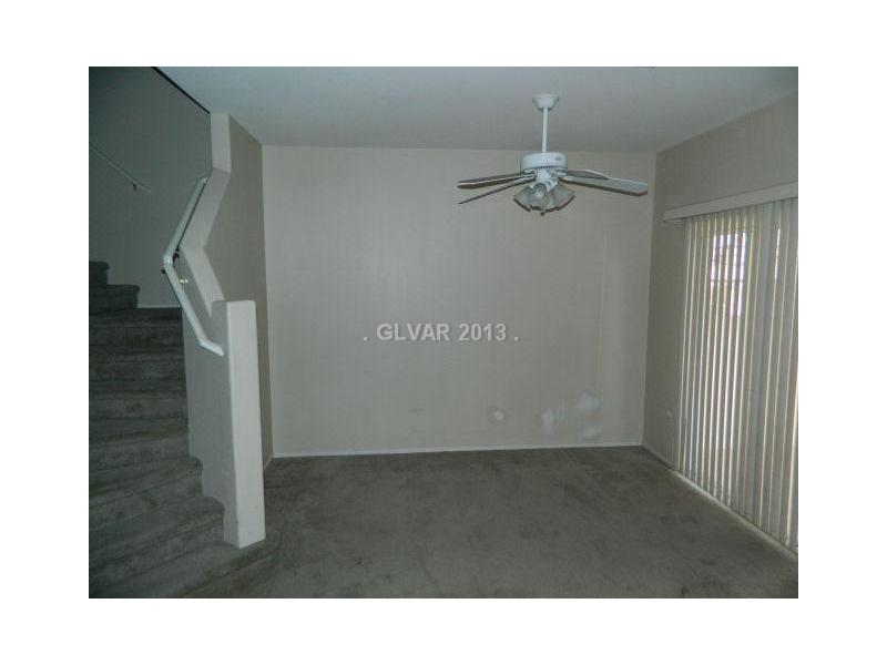 1553 Rusty Ridge Lane Henderson, NV 89002 - Photo 6 of 35 Dining Room. DINING ROOM WITH SLIDING GLASS DOOR TO THE PATIO