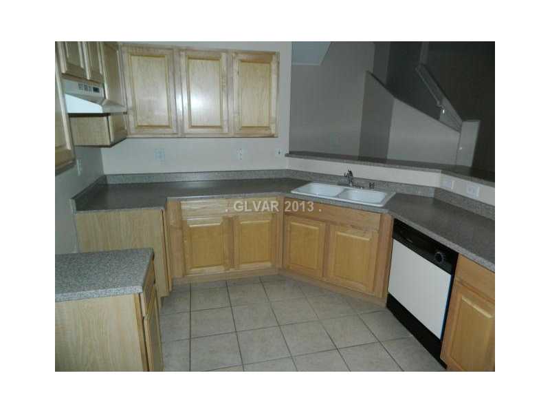 1553 Rusty Ridge Lane Henderson, NV 89002 - Photo 7 of 35 Kitchen. STEP SAVER KITCHEN