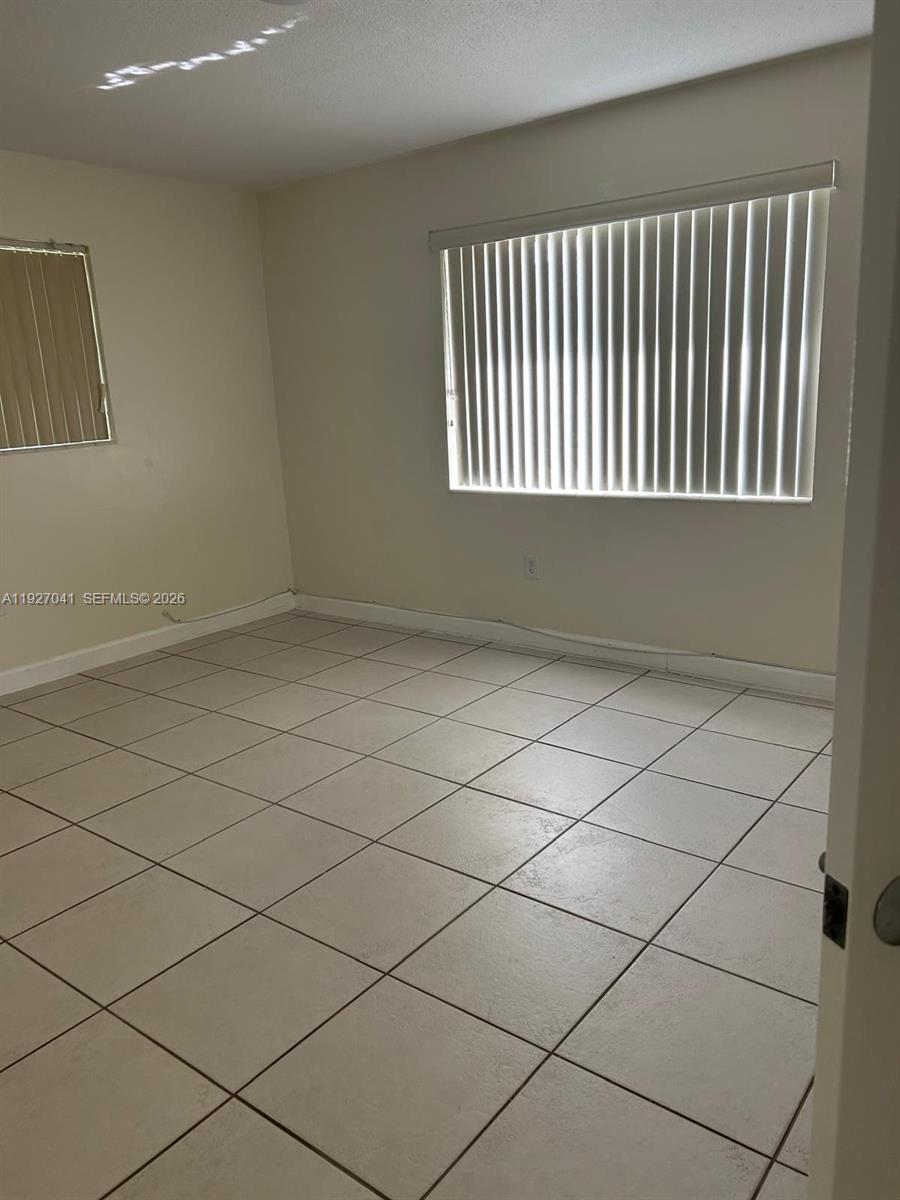 10011 Southwest 162nd Street Miami, FL 33157 - Photo 12 of 22 a view of a garage