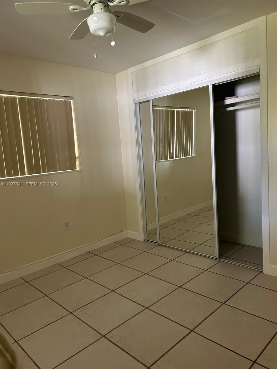 10011 Southwest 162nd Street Miami, FL 33157 - Photo 15 of 22 a view of entryway with wooden floor