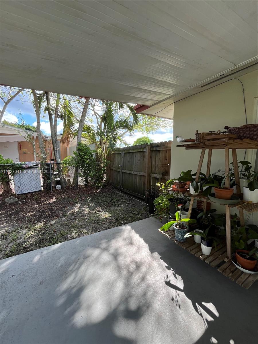 10011 Southwest 162nd Street Miami, FL 33157 - Photo 18 of 18 a view of a garage with a sitting area