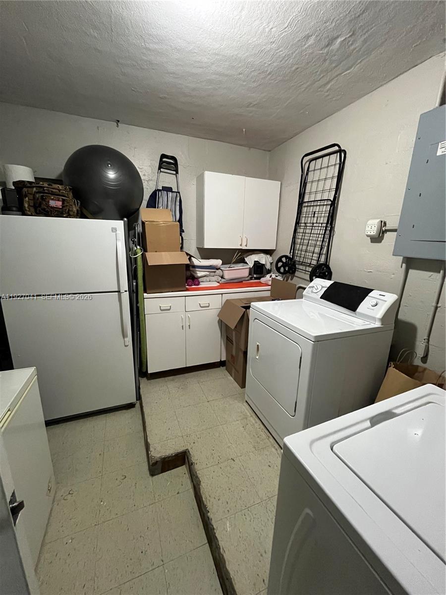 10011 Southwest 162nd Street Miami, FL 33157 - Photo 8 of 18 a utility room with dryer and washer