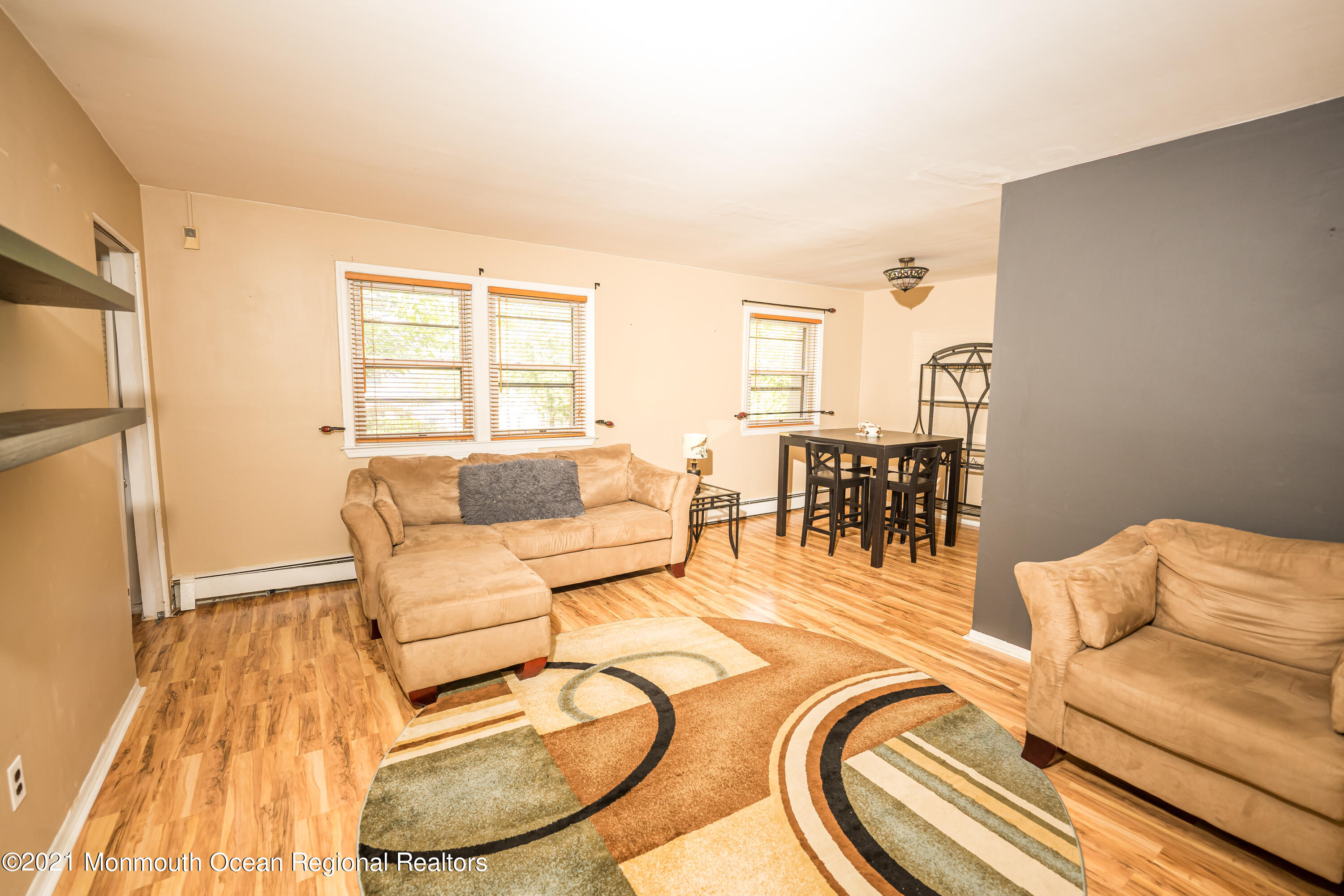 420 Cross Road, Unit B2 Matawan, NJ 07747 - Photo 3 of 8 a living room with furniture and a table