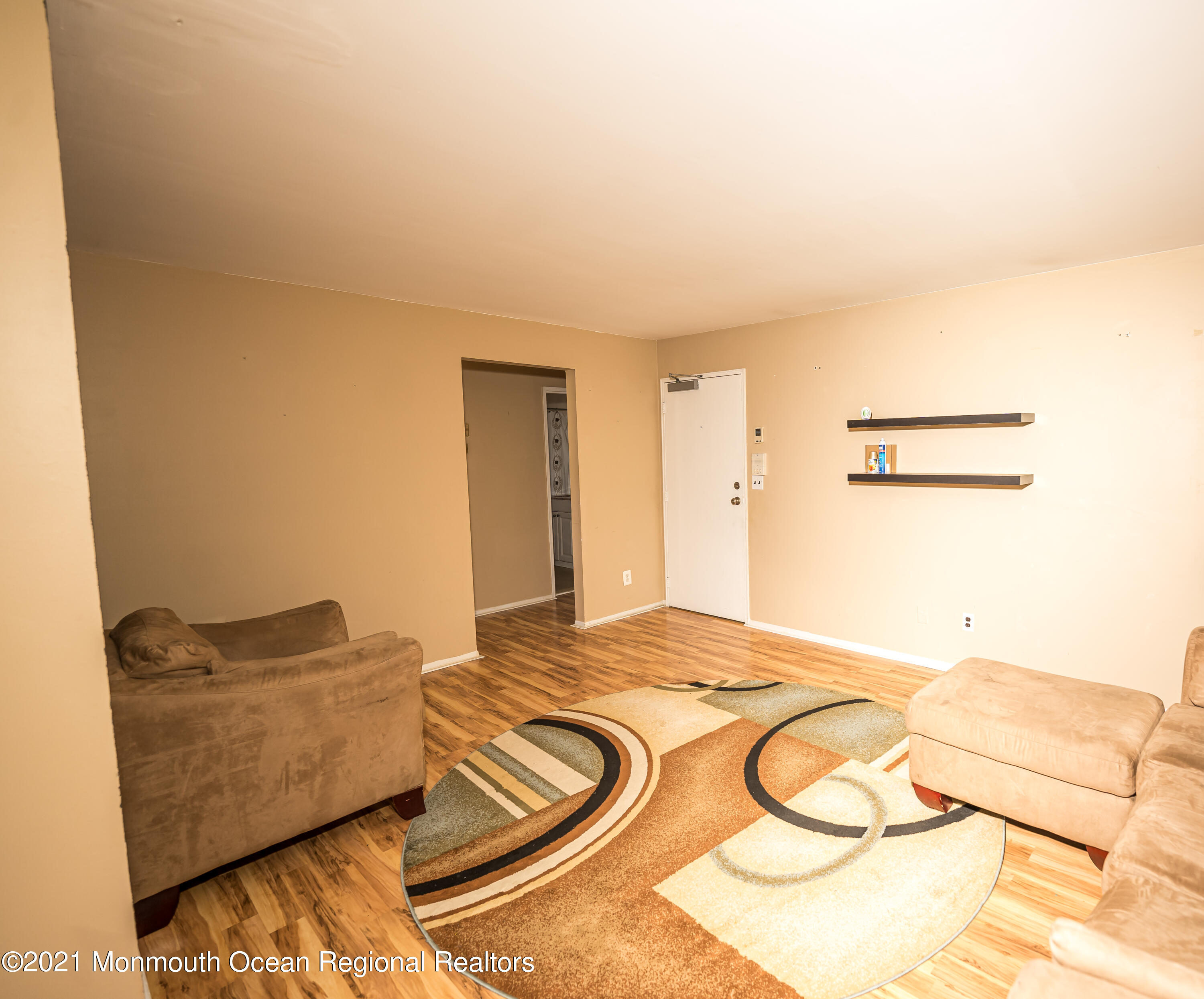 420 Cross Road, Unit B2 Matawan, NJ 07747 - Photo 4 of 8 a bedroom with a bed and a cabinets