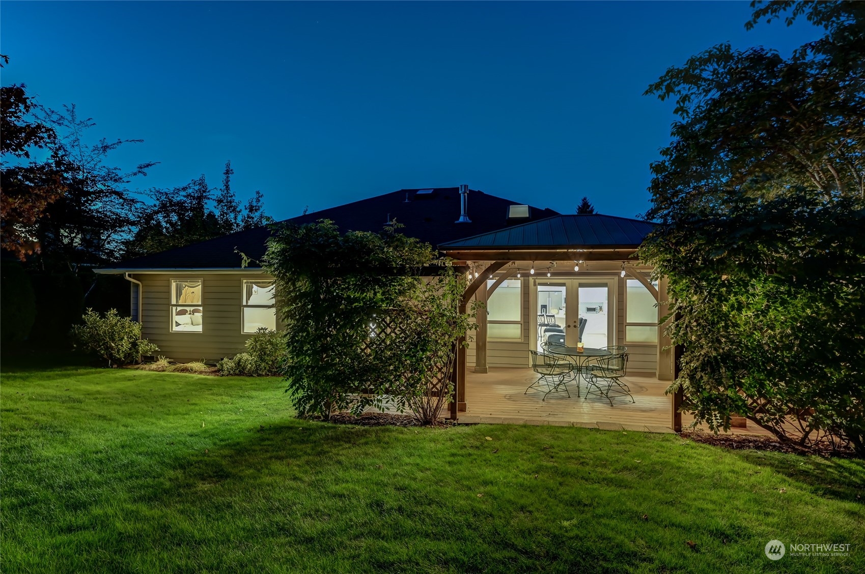 2504 240th Street Southeast Bothell, WA 98021 - Photo 34 of 40 a front view of a house with a garden