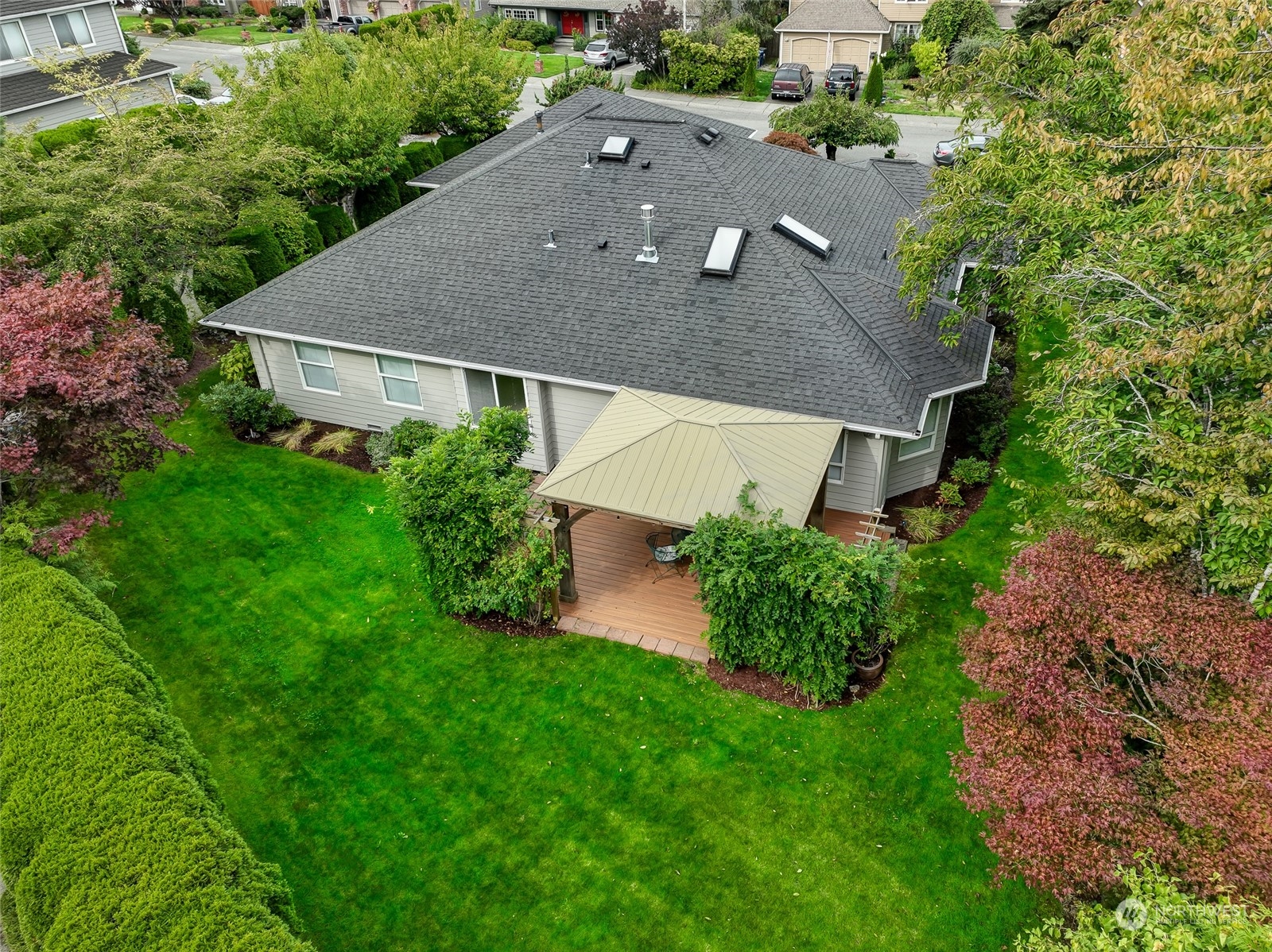 2504 240th Street Southeast Bothell, WA 98021 - Photo 37 of 40 an aerial view of a house with a yard and a garage