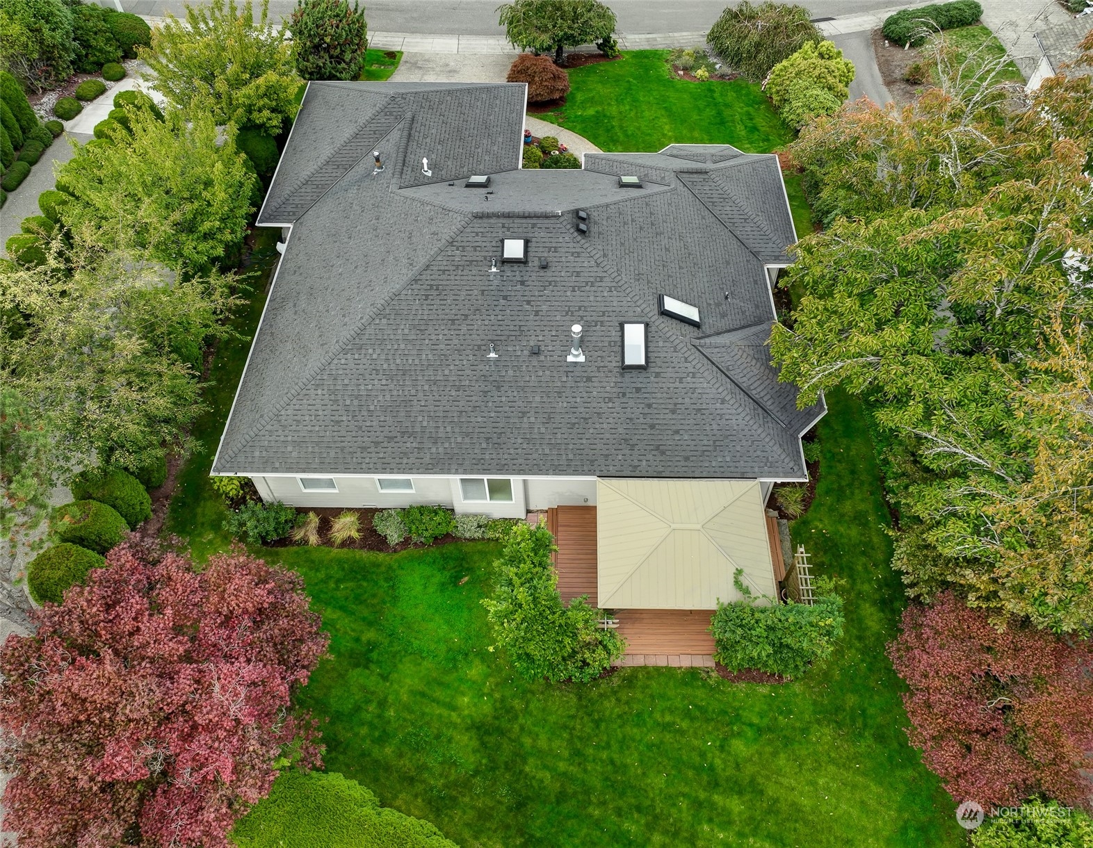 2504 240th Street Southeast Bothell, WA 98021 - Photo 38 of 40 an aerial view of a house with a yard and a pool