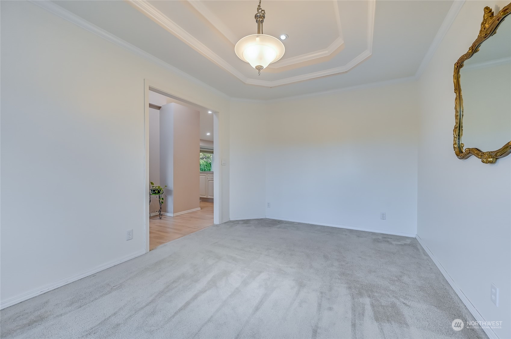 2504 240th Street Southeast Bothell, WA 98021 - Photo 8 of 40 an empty room with chandelier fan and windows