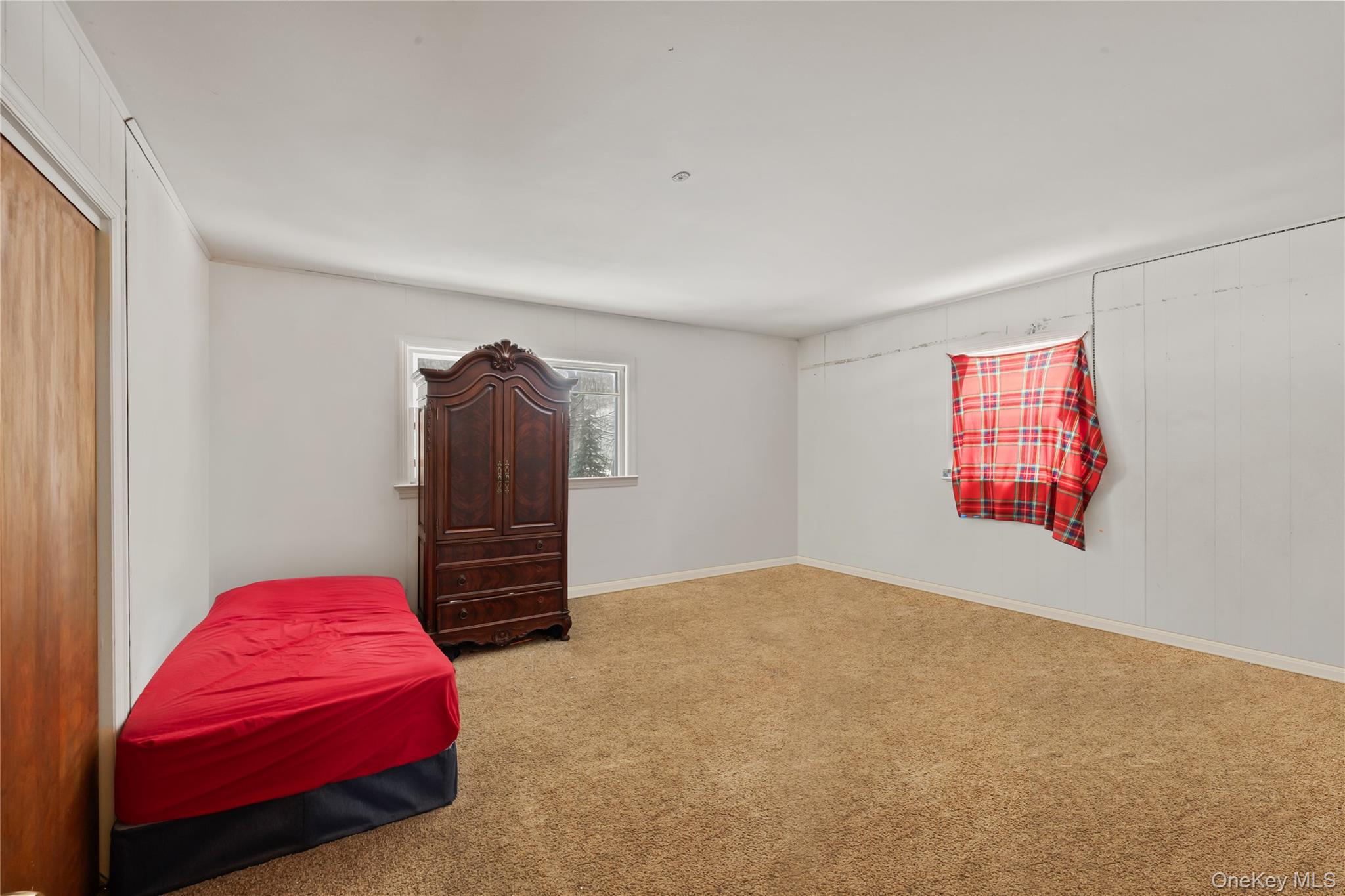 4 Haskell Avenue Suffern, NY 10901 - Photo 8 of 24 a bedroom with a bed and a window