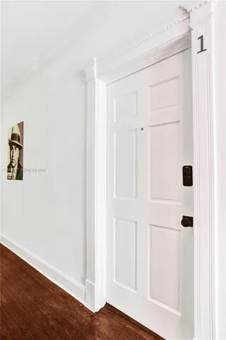 a view of a livingroom with wooden floor