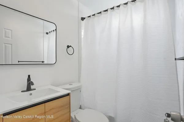 a kitchen with stainless steel appliances a sink and cabinets