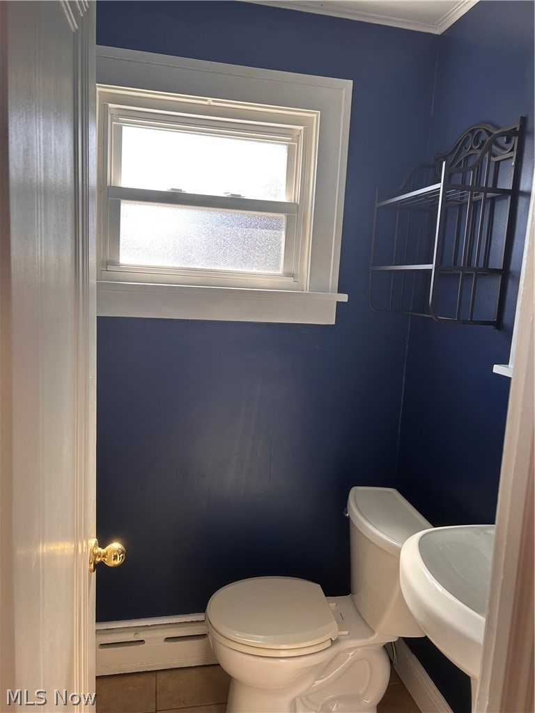 1001 Englewood Road Cleveland Heights, OH 44121 - Photo 4 of 28 Bathroom with a baseboard radiator and tile patterned flooring