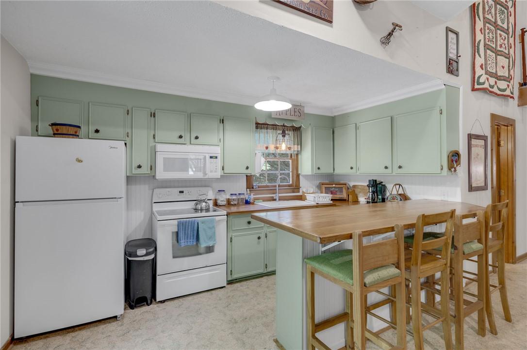 437 West Gate Road Pickens, SC 29671 - Photo 42 of 47 This cozy kitchen features a classic layout, ready for culinary creativity.