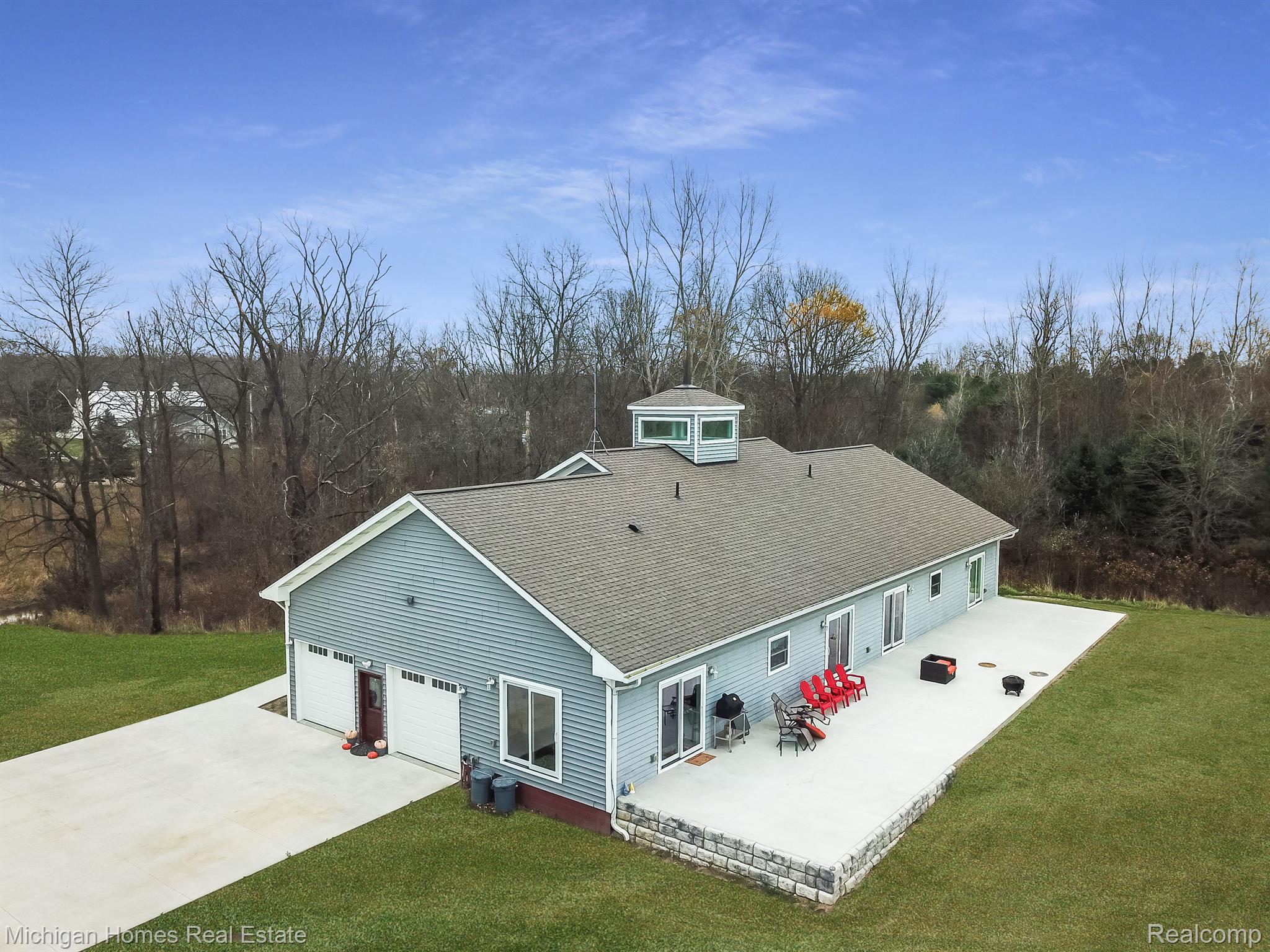 14200 Fagan Road Holly, MI 48442 - Photo 4 of 5 Side / Rear view of home
New concrete patio 2022
