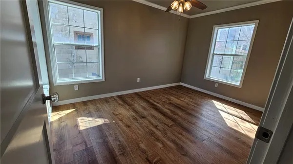a view of an empty room and window