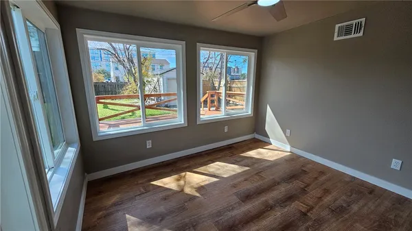 a view of an empty room and window