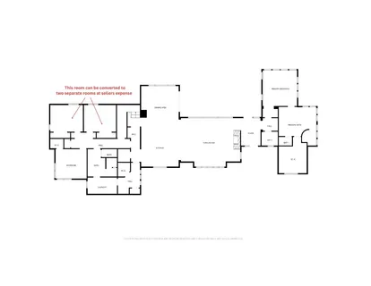 a living room with patio furniture and a large window