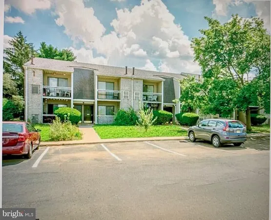 a view of street with parked cars