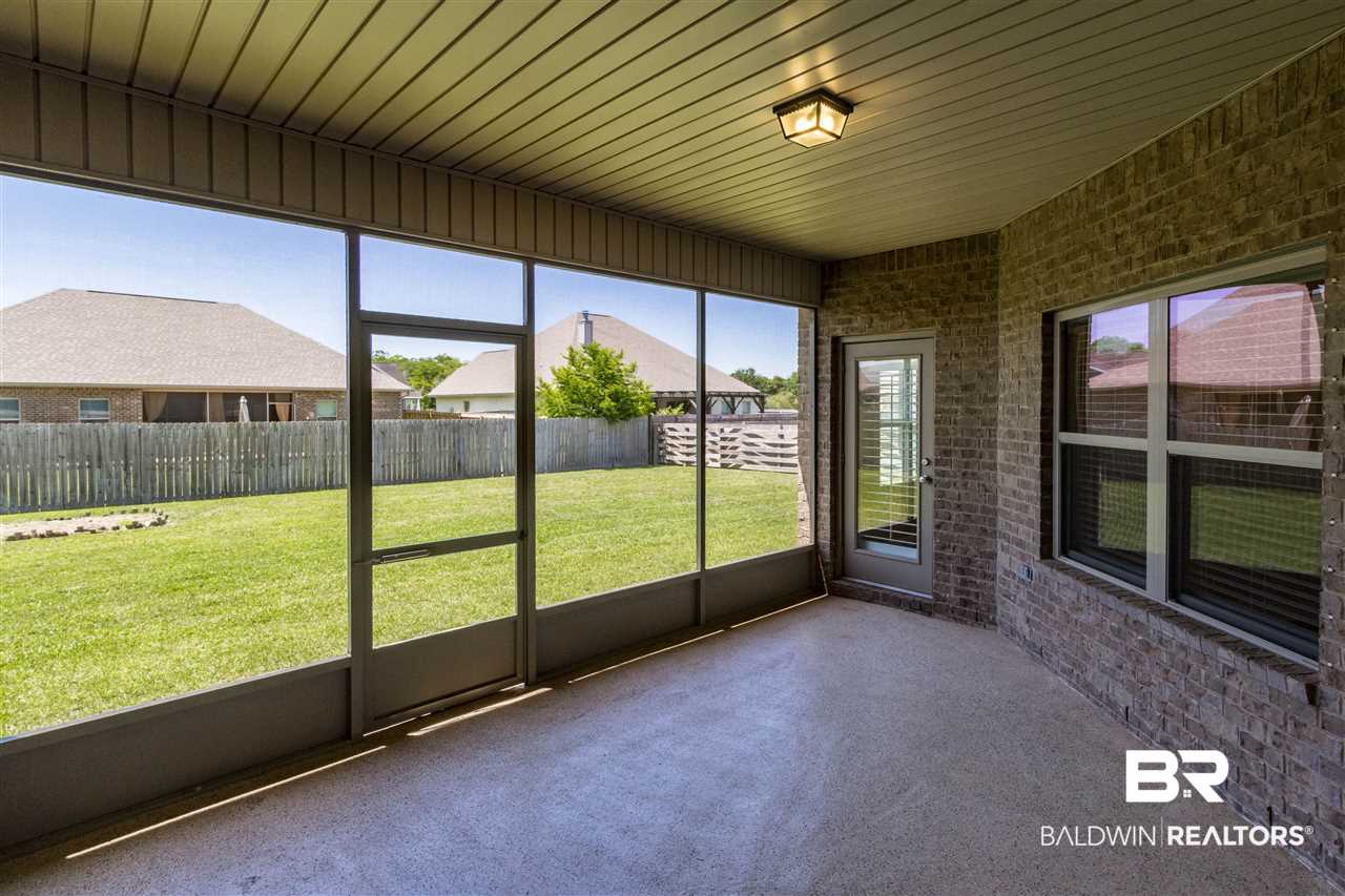 7076 Rocky Rd Loop Gulf Shores, AL 36542 - Photo 24 of 34 Screened in back porch