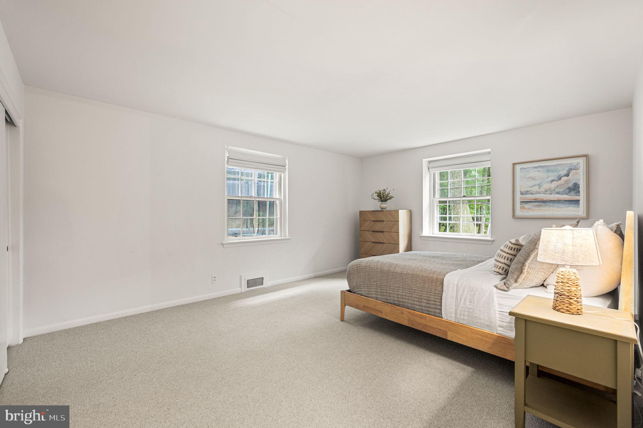 434 Pugh Road Wayne, PA 19087 - Photo 27 of 47 a bedroom with a bed and window