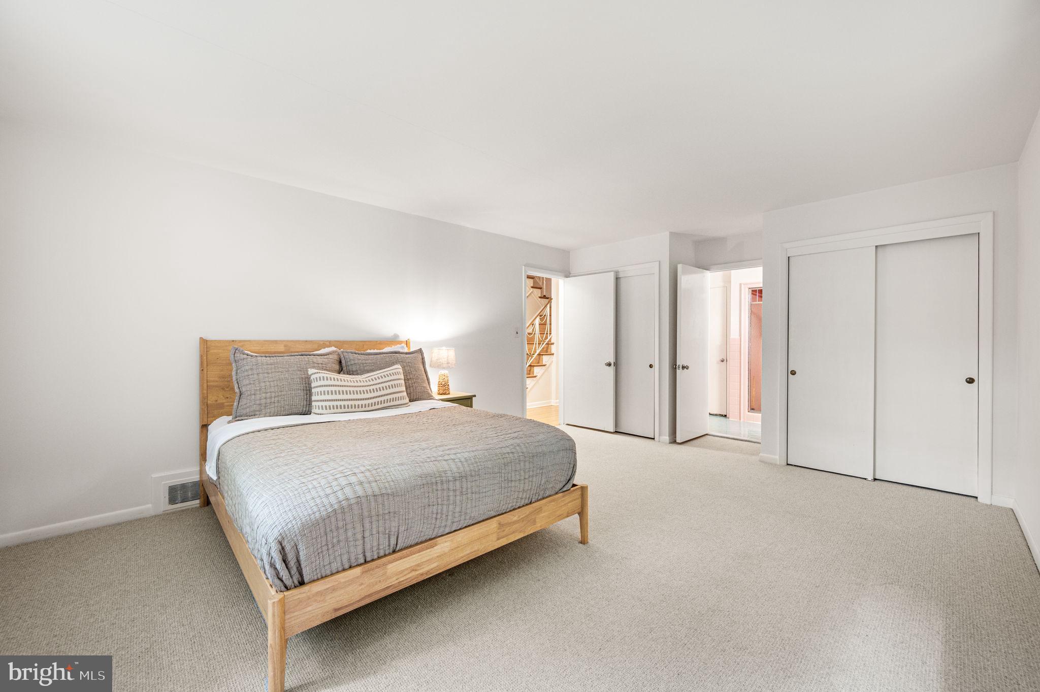 434 Pugh Road Wayne, PA 19087 - Photo 28 of 47 a spacious bedroom with a bed and closet