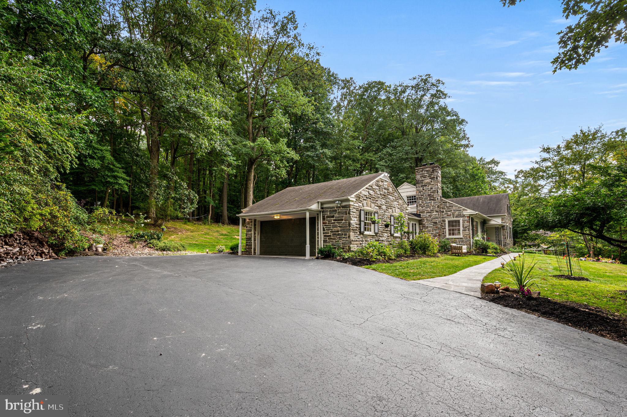 434 Pugh Road Wayne, PA 19087 - Photo 3 of 47 a view of a house with a yard and pathway