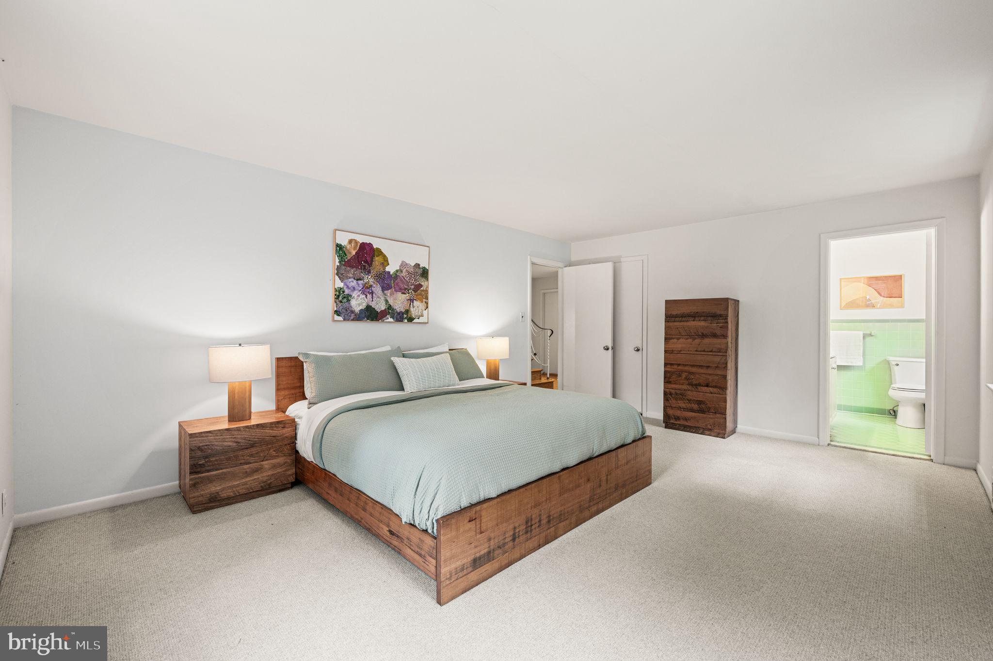 434 Pugh Road Wayne, PA 19087 - Photo 31 of 47 a spacious bedroom with a bed and dresser