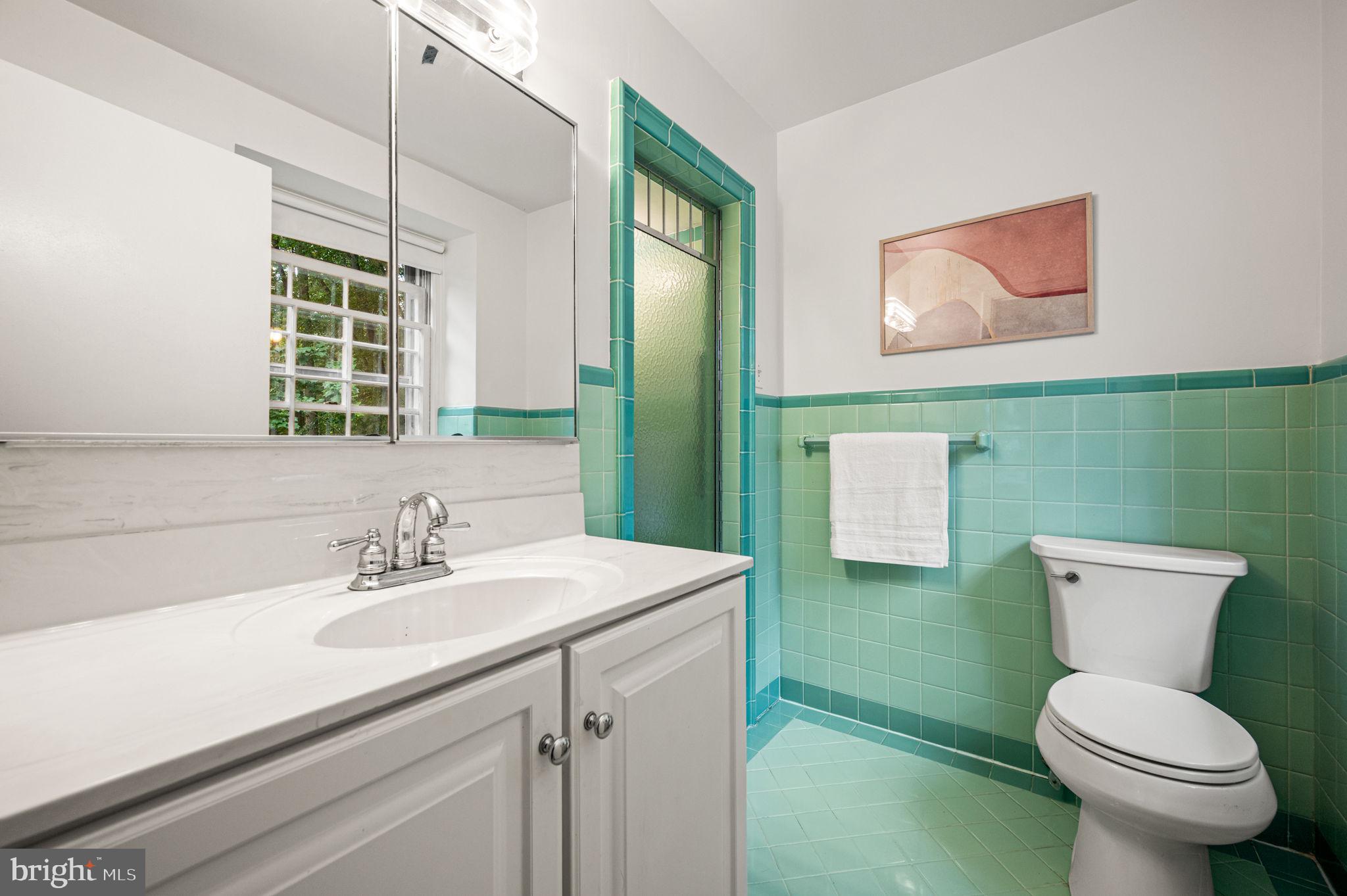 434 Pugh Road Wayne, PA 19087 - Photo 33 of 47 a bathroom with a toilet sink and mirror