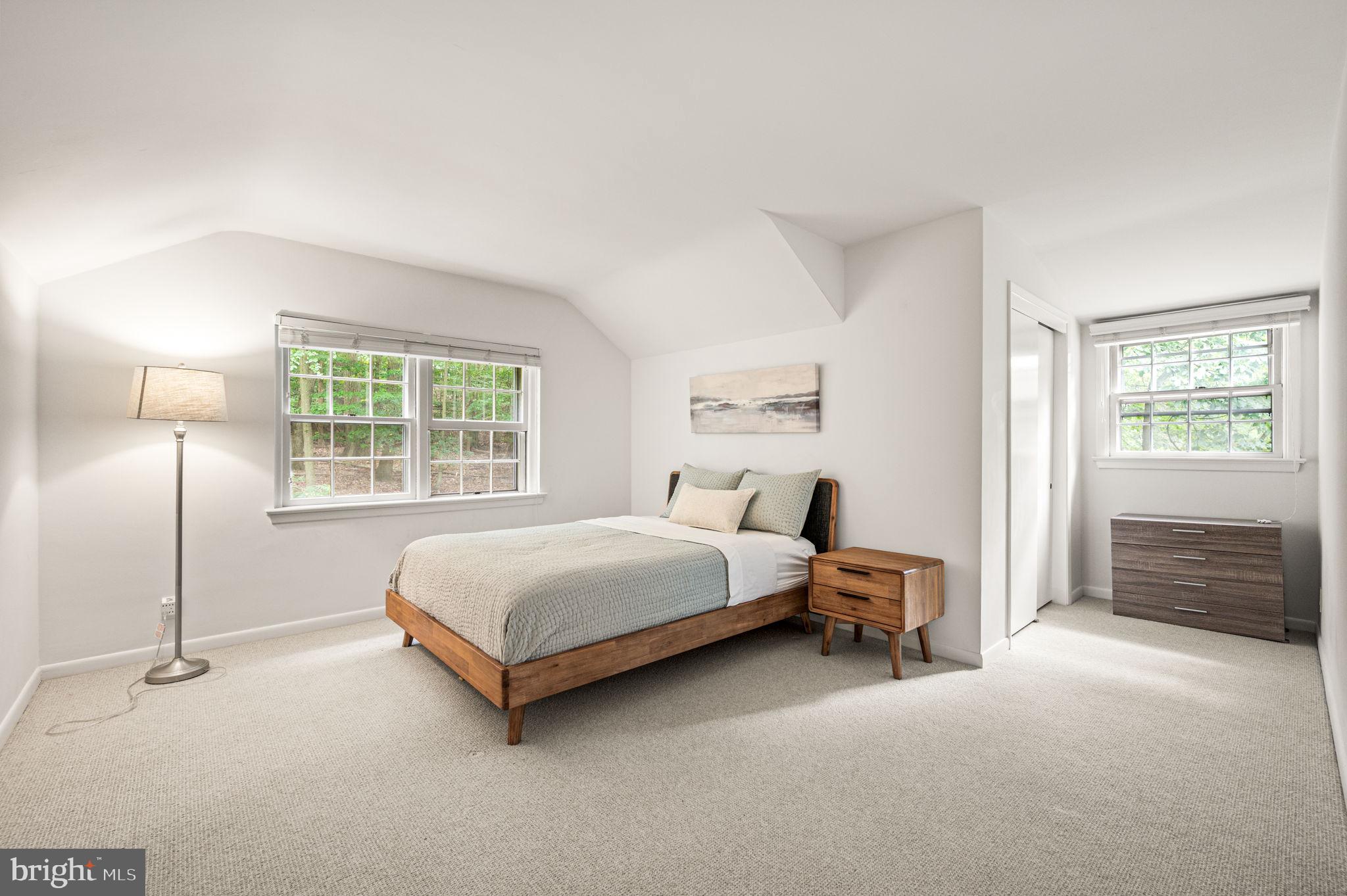 434 Pugh Road Wayne, PA 19087 - Photo 38 of 47 a spacious bedroom with a bed and a window