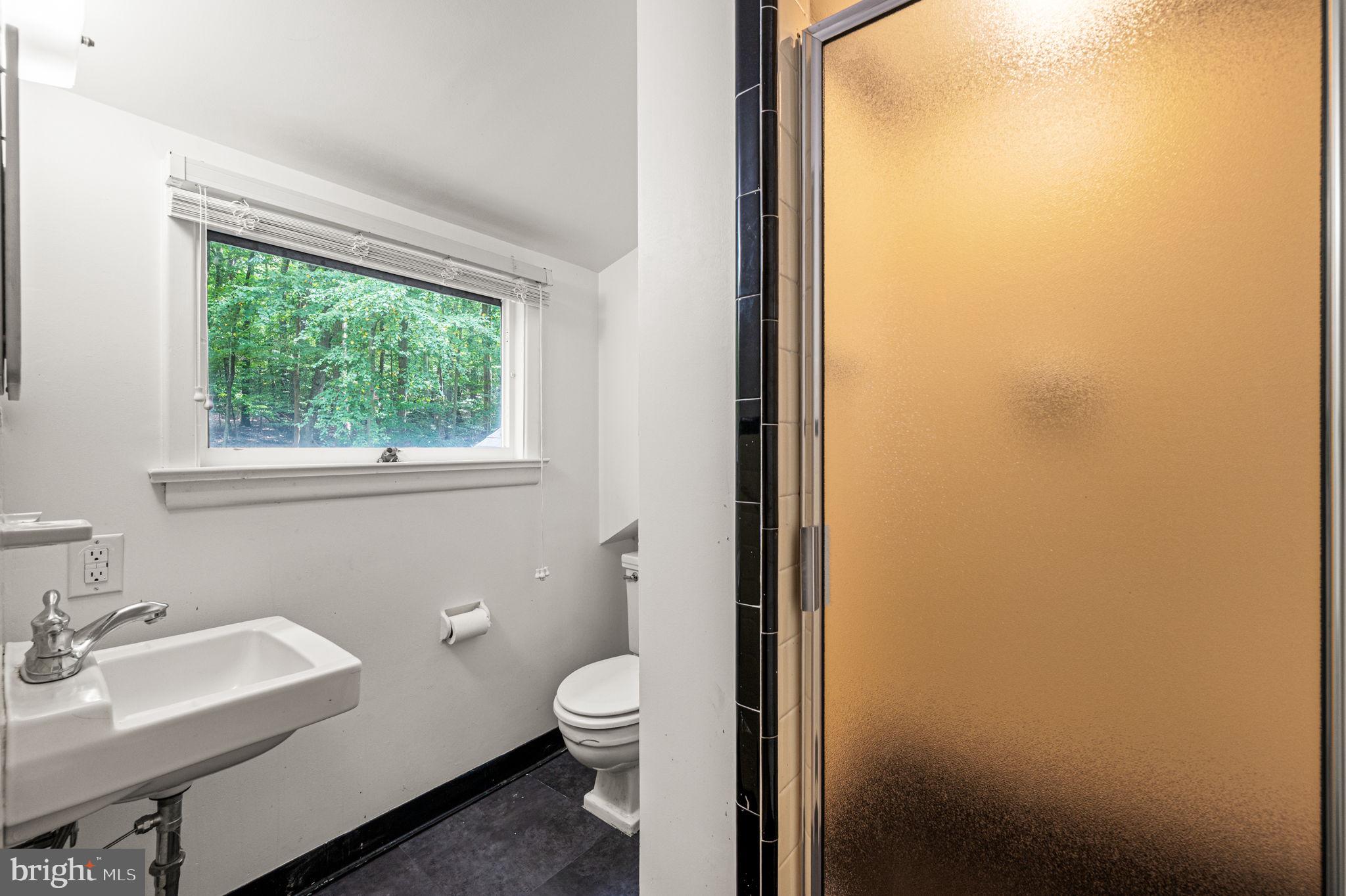 434 Pugh Road Wayne, PA 19087 - Photo 41 of 47 a bathroom with a sink and a toilet