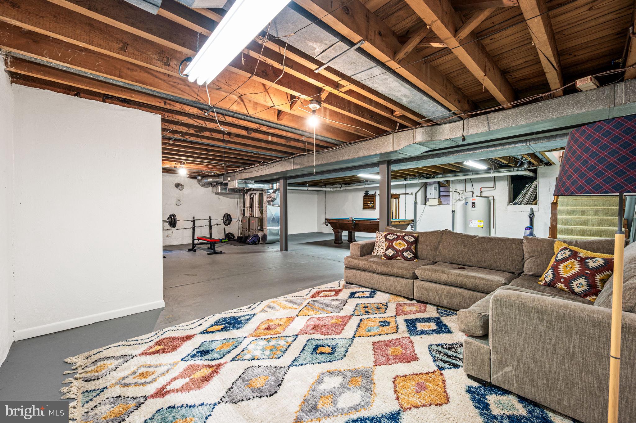 434 Pugh Road Wayne, PA 19087 - Photo 42 of 47 a living room with furniture and a rug