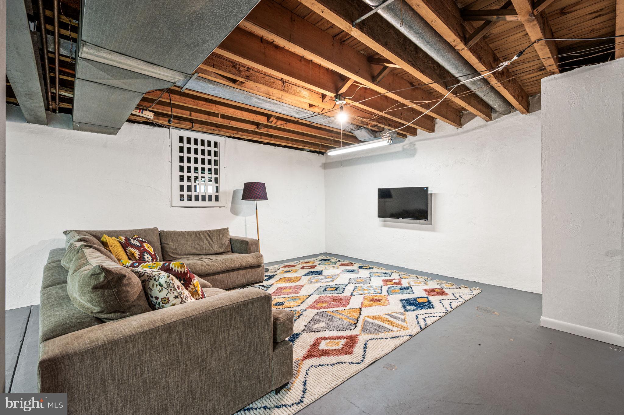 434 Pugh Road Wayne, PA 19087 - Photo 43 of 47 a living room with furniture and a rug