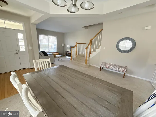 a view of a livingroom with furniture and wooden floor