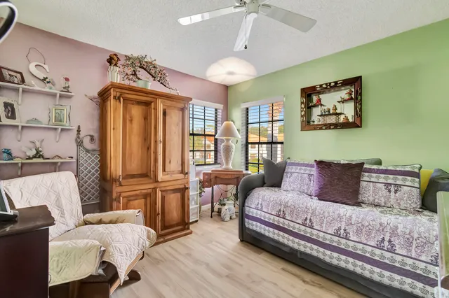 a bedroom with a bed and furniture