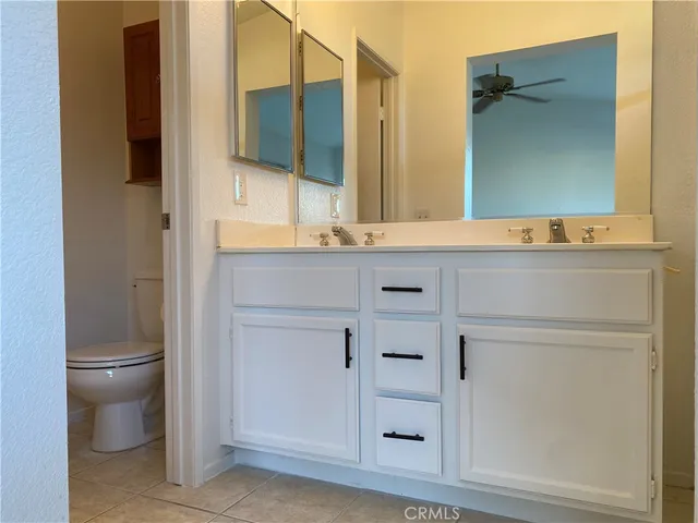 a bathroom with a sink and a toilet