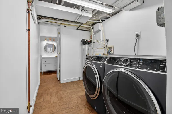 a utility room with dryer and washer