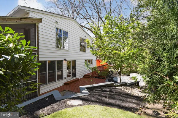 a backyard of a house with seating space