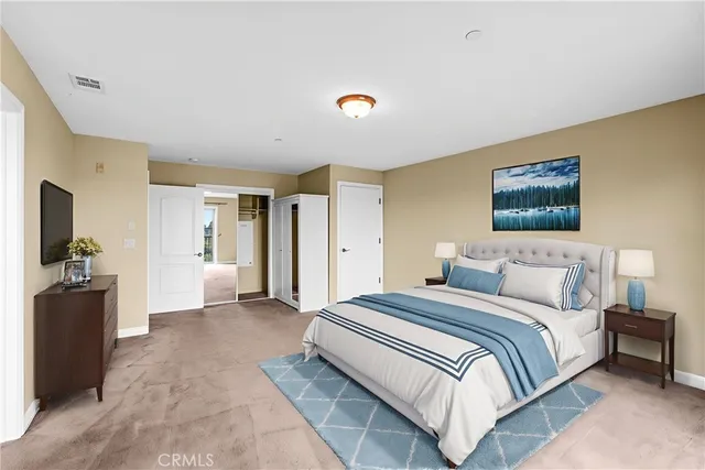 a bathroom with a granite countertop sink mirror and a shower