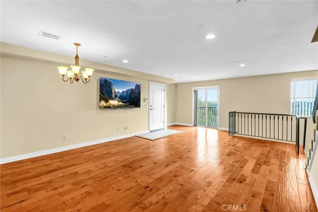 a living room with furniture fireplace and flat screen tv