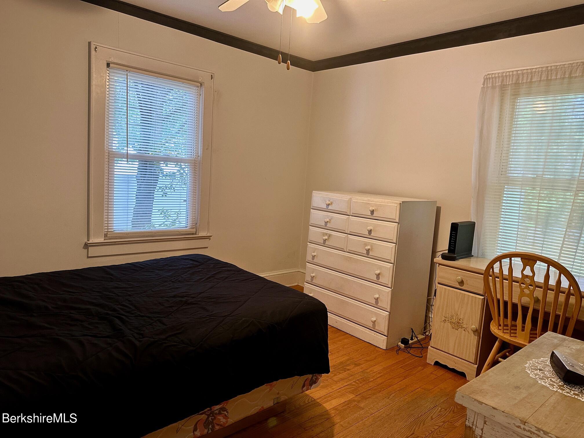 80 Preston Avenue Pittsfield, MA 01201 - Photo 14 of 33 a bedroom with a bed and a window