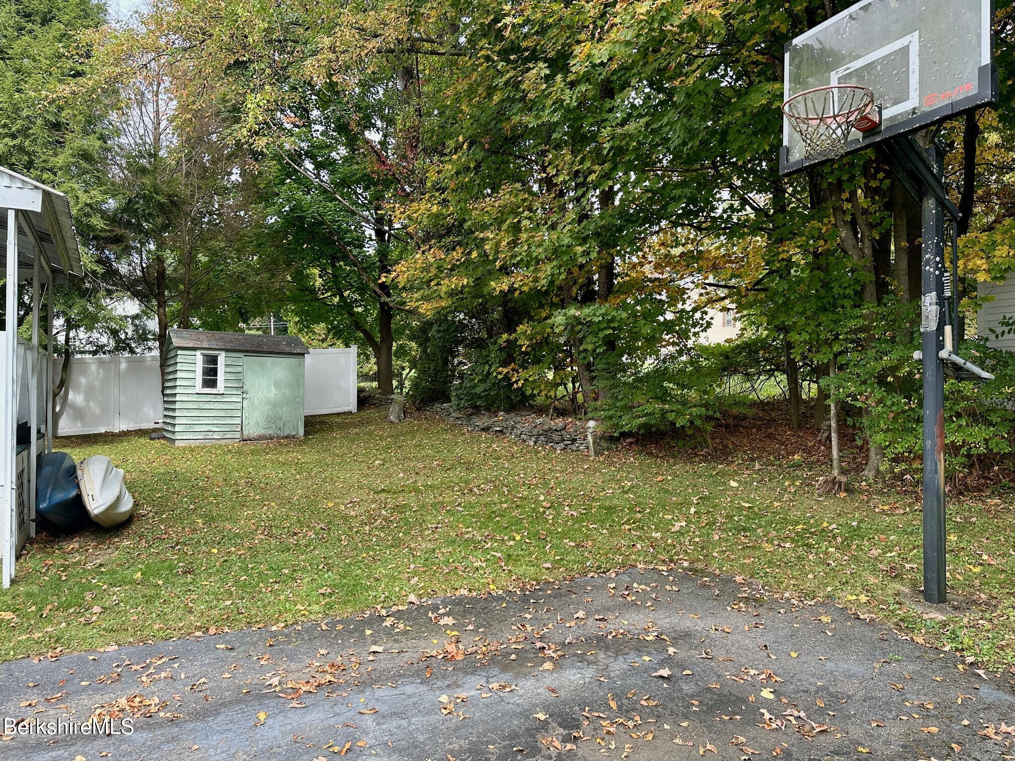 80 Preston Avenue Pittsfield, MA 01201 - Photo 16 of 33 a backyard of a house with lots of green space