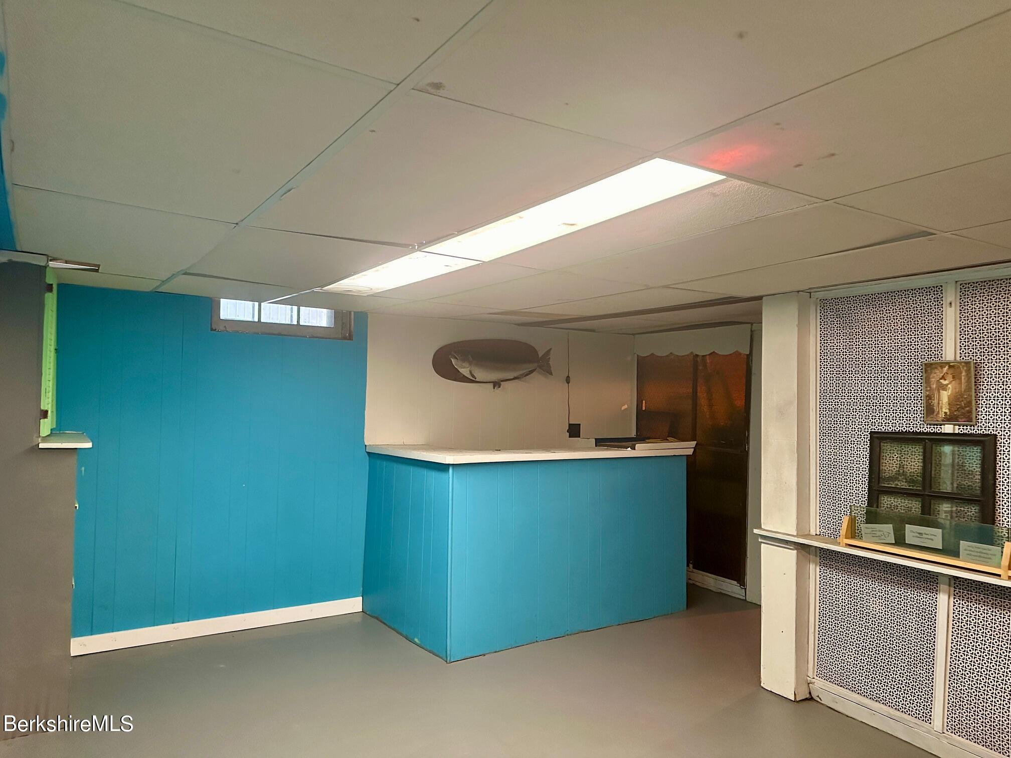 80 Preston Avenue Pittsfield, MA 01201 - Photo 25 of 33 a kitchen with stainless steel appliances a refrigerator and a stove