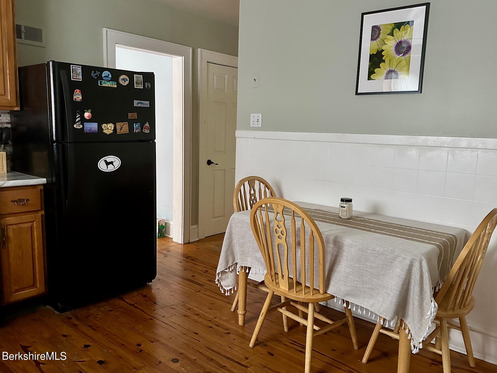 80 Preston Avenue Pittsfield, MA 01201 - Photo 5 of 33 a view of a hallway with wooden floor and windows