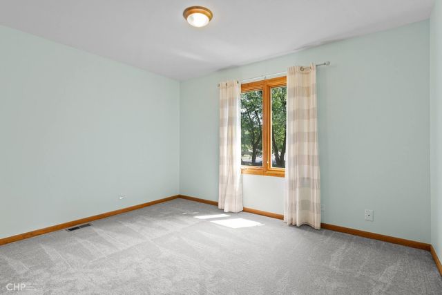 an empty room with closet area