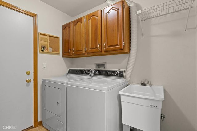 a view of a room with wooden walls