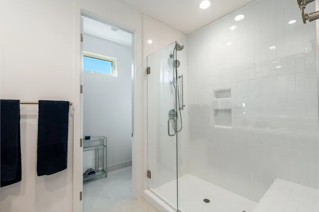 a view of a chairs and table in the patio