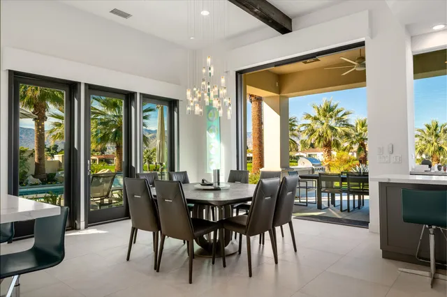 a kitchen that has a sink and a stove in it