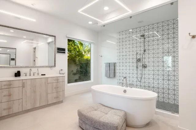a bathroom with a sink toilet and a mirror