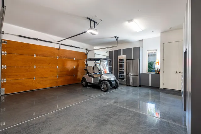 a view of a swimming pool with a lounge chair and swimming pool